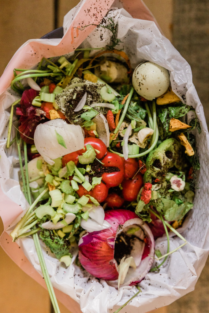 Image of food waste piled in a trash can